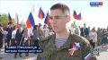 В лучах восходящего солнца над Белгородом реет Знамя Победы
