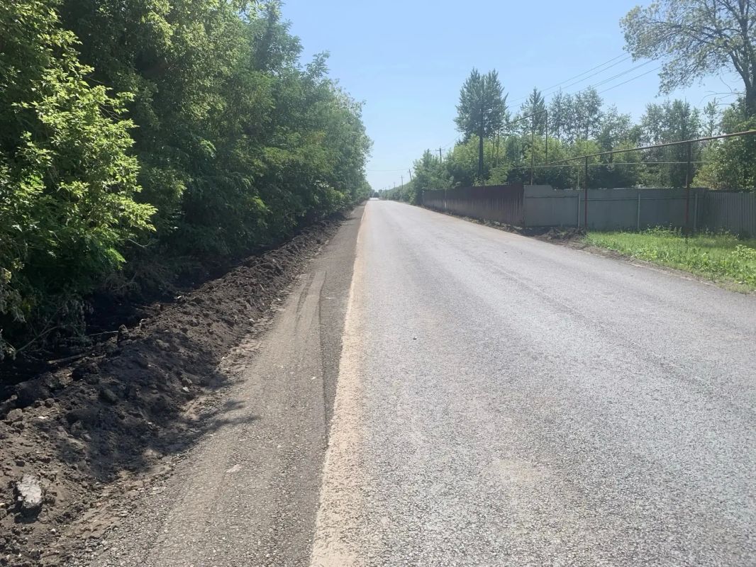 В Красногвардейском округе продолжается ремонт дороги возле Николаевского